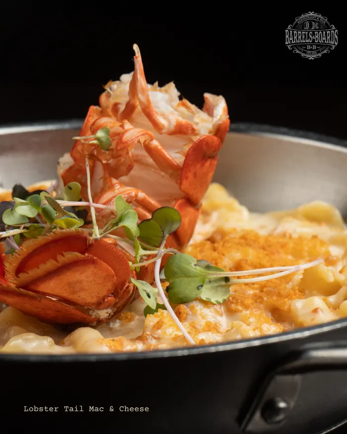 Lobster tail mac and cheese in an iron skillet